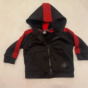 Body Glove. Infant 6/9 month. Excellent condition. Lined zip up. Red & black.